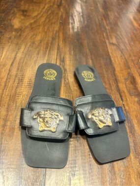 Versace Black Leather Slides with Gold Medusa Plaque